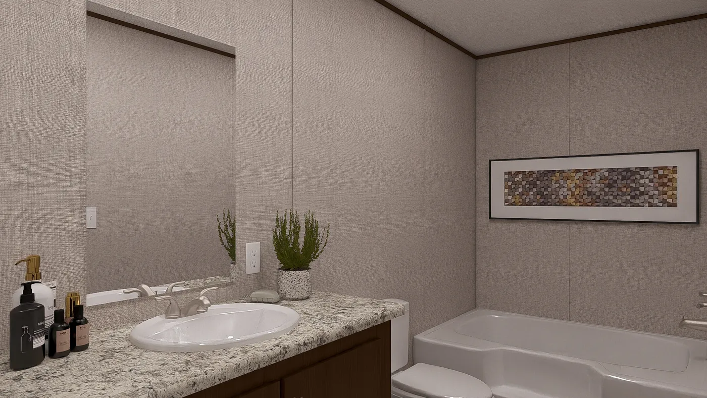 The BIRCH Primary Bathroom. This Manufactured Mobile Home features 3 bedrooms and 2 baths.