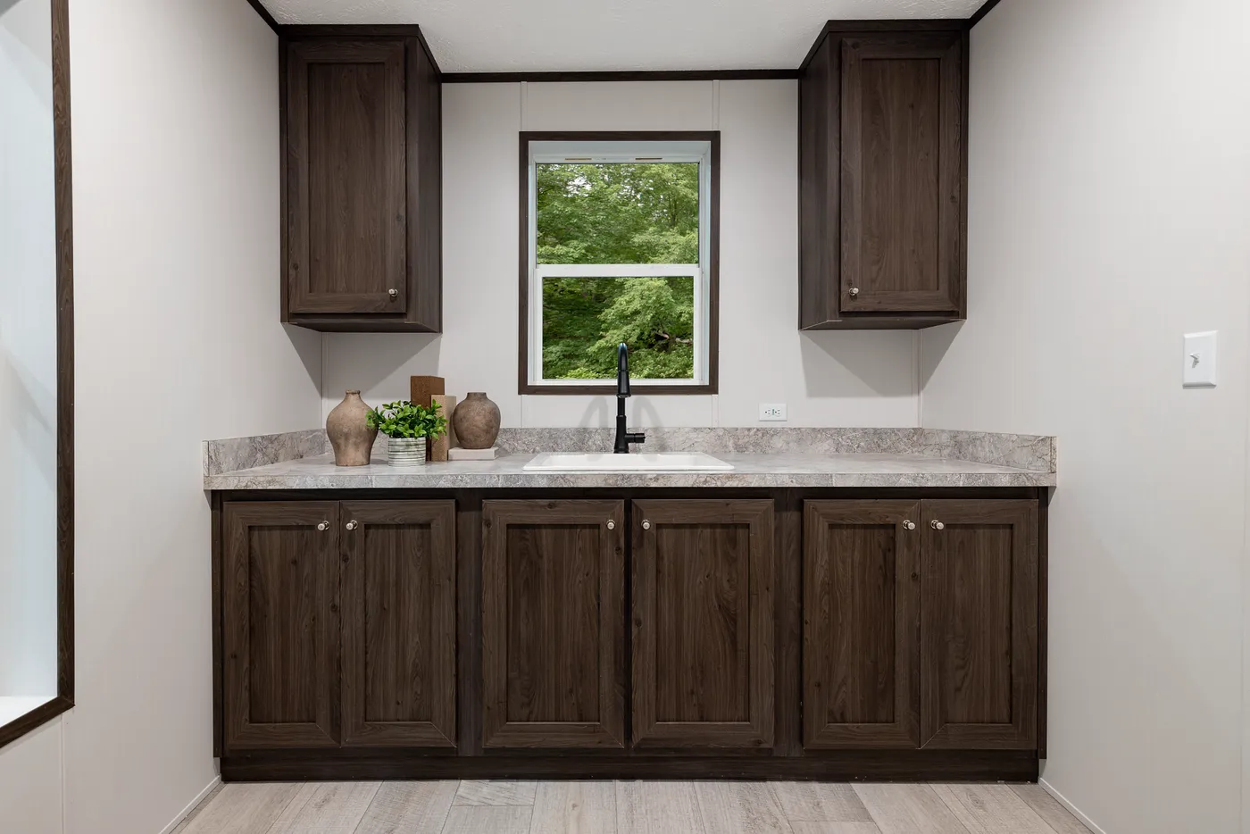 The CRESTWOOD Utility Room. This Manufactured Mobile Home features 3 bedrooms and 2 baths.