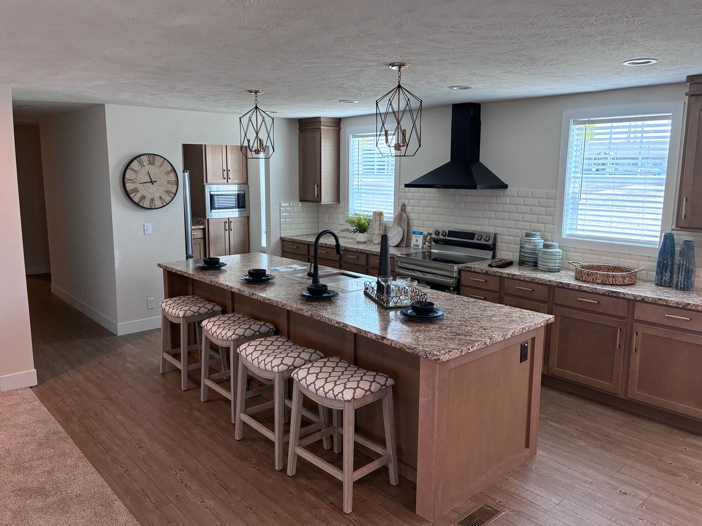 The BUTLER PLACE/6428-MS056 SECT Kitchen WITH CARMEL LATTE CABINETS
