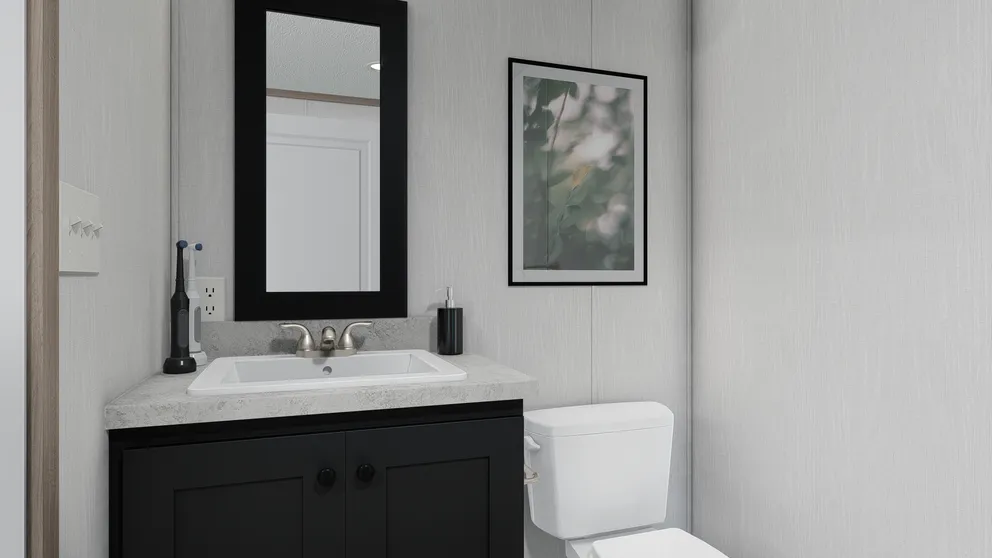 The 6016-4711 THE PULSE Primary Bathroom. This Manufactured Mobile Home features 2 bedrooms and 2 baths.