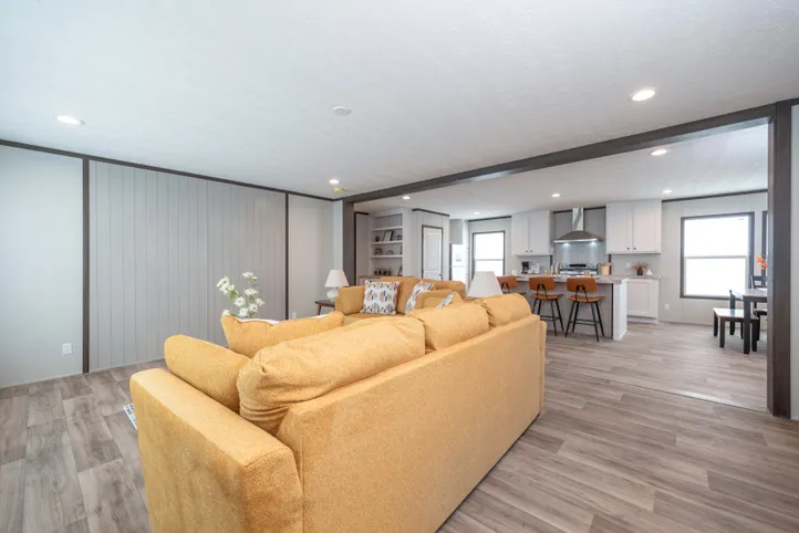 The EMPOWER Living Room. This Manufactured Mobile Home features 4 bedrooms and 2 baths.