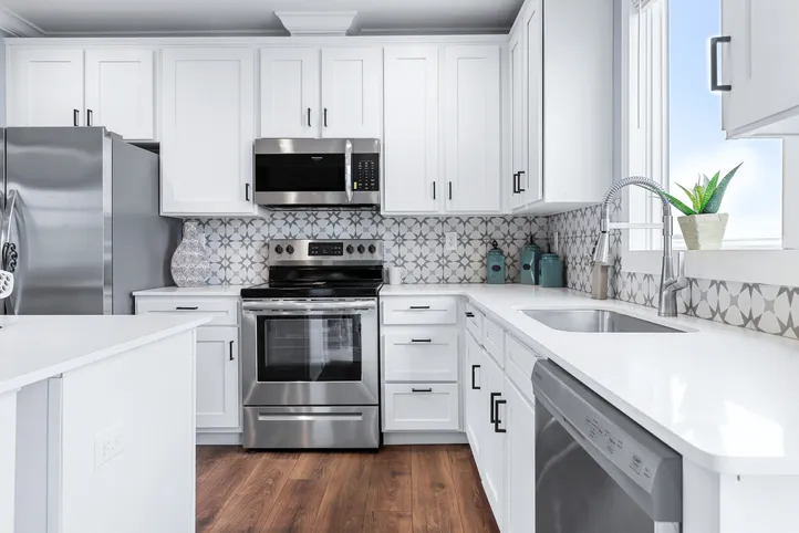 The THE ATLAS Kitchen. This Manufactured Mobile Home features 4 bedrooms and 3 baths.