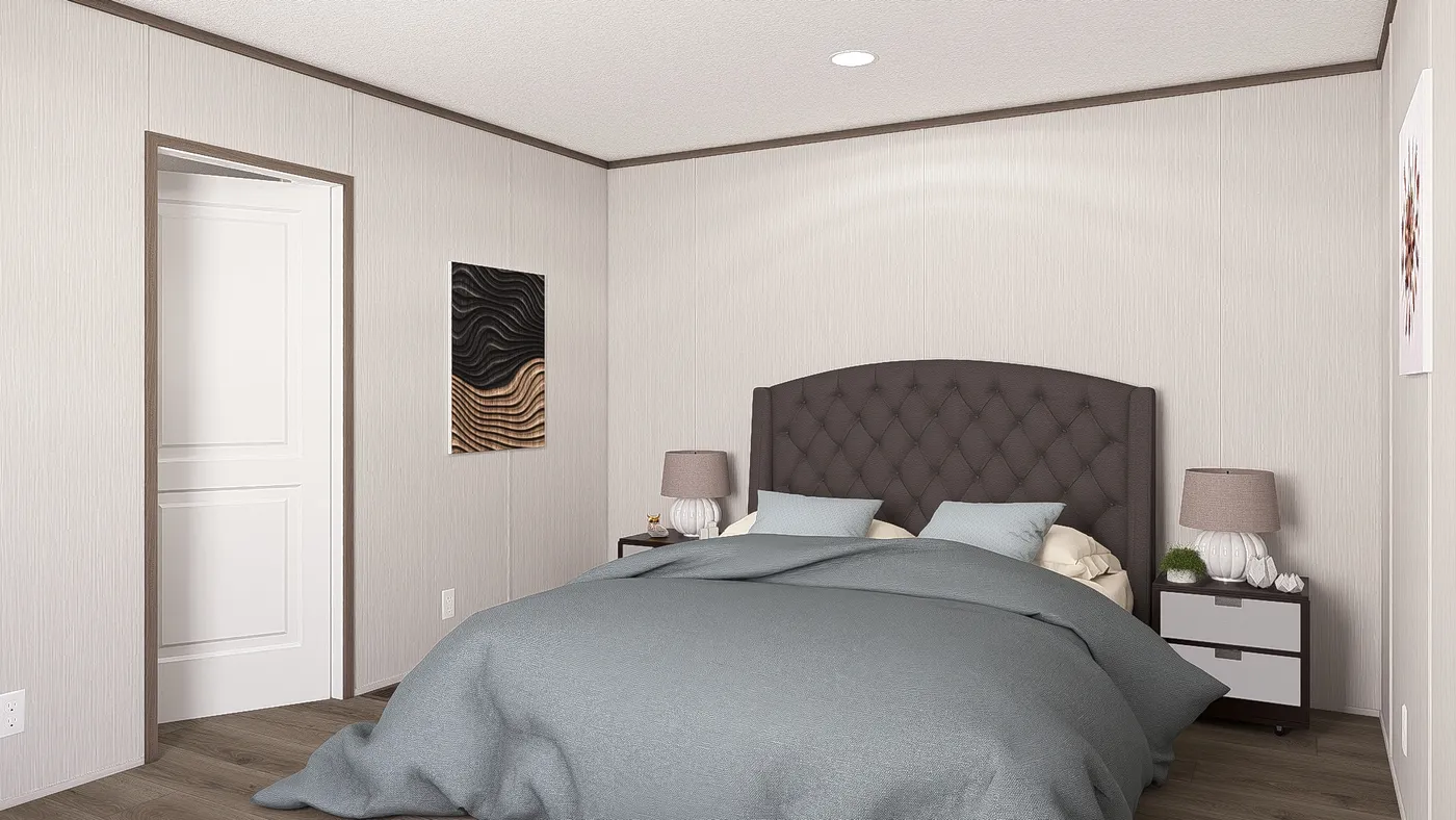 The LEGEND ANNIVERSARY 16X76 Primary Bedroom. This Manufactured Mobile Home features 3 bedrooms and 2 baths.