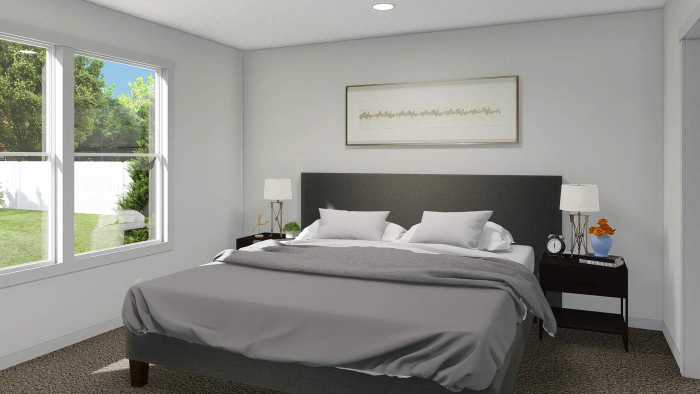 The ROCKET MAN Primary Bedroom. This Manufactured Mobile Home features 3 bedrooms and 2 baths.