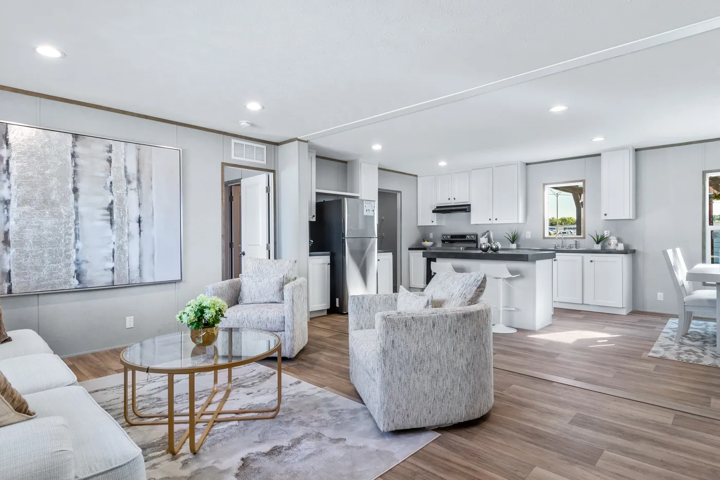 The ASPIRE Living Room. This Manufactured Mobile Home features 3 bedrooms and 2 baths.