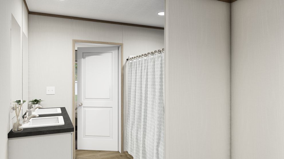 The VISTA Primary Bathroom. This Manufactured Mobile Home features 3 bedrooms and 2 baths.