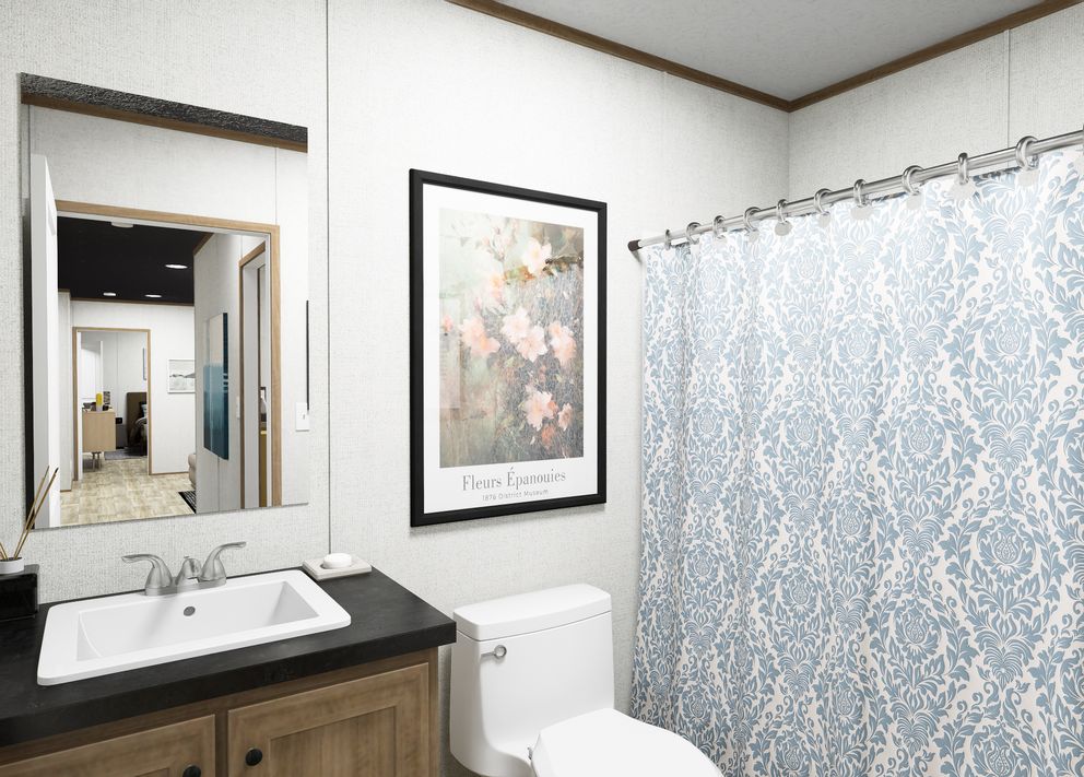 The VISTA Guest Bathroom. This Manufactured Mobile Home features 3 bedrooms and 2 baths.