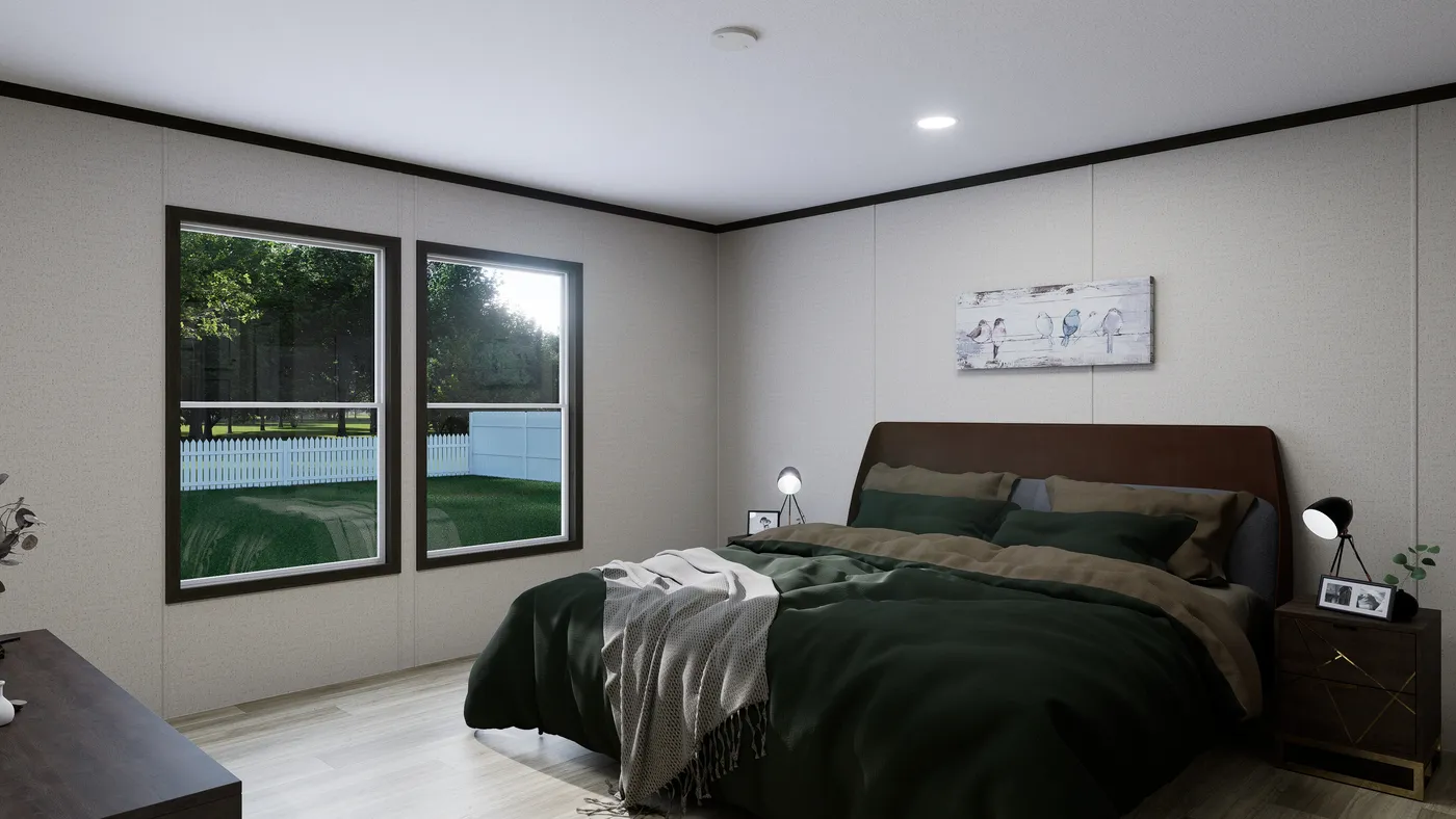 The VENTURE Primary Bedroom. This Manufactured Mobile Home features 4 bedrooms and 2 baths.