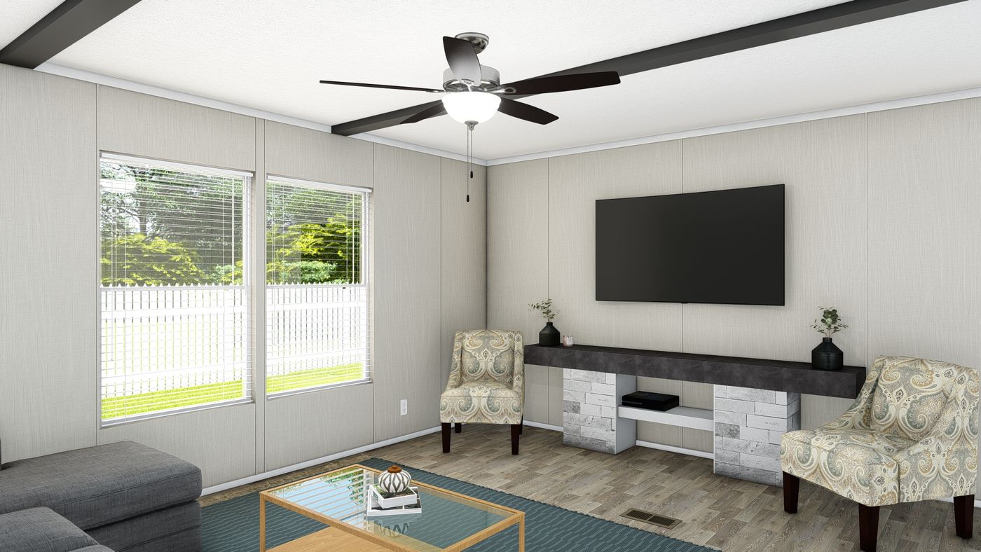 The TRADITION 60B Family Room. This Manufactured Mobile Home features 3 bedrooms and 2 baths.