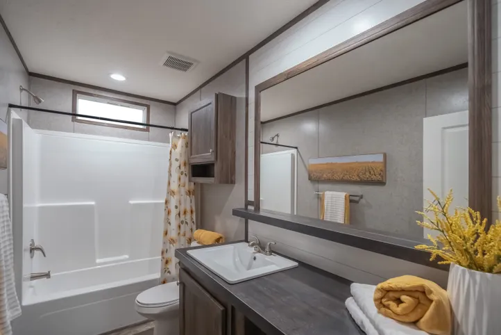 The LOCKLEAR Exterior. This Manufactured Mobile Home features 4 bedrooms and 2 baths.