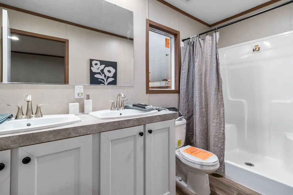 The SPIRIT Primary Bathroom. This Manufactured Mobile Home features 2 bedrooms and 2 baths.