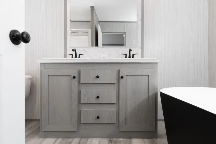 The THE ANNIVERSARY 76 Primary Bathroom. This Manufactured Mobile Home features 3 bedrooms and 2 baths.