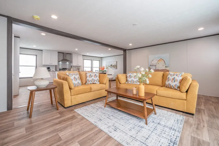 The EMPOWER Living Room. This Manufactured Mobile Home features 4 bedrooms and 2 baths.