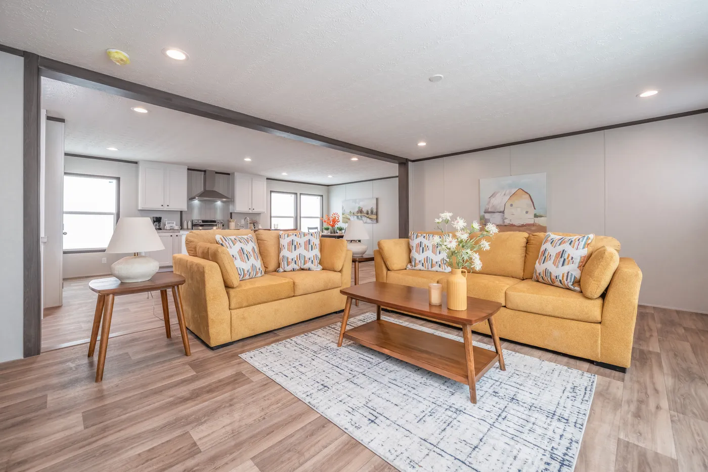 The EMPOWER Living Room. This Manufactured Mobile Home features 4 bedrooms and 2 baths.