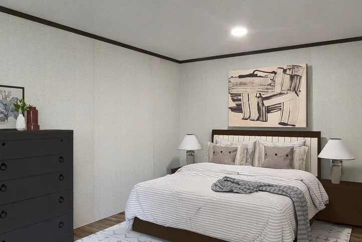 The BALANCE Primary Bedroom. This Manufactured Mobile Home features 3 bedrooms and 2 baths.