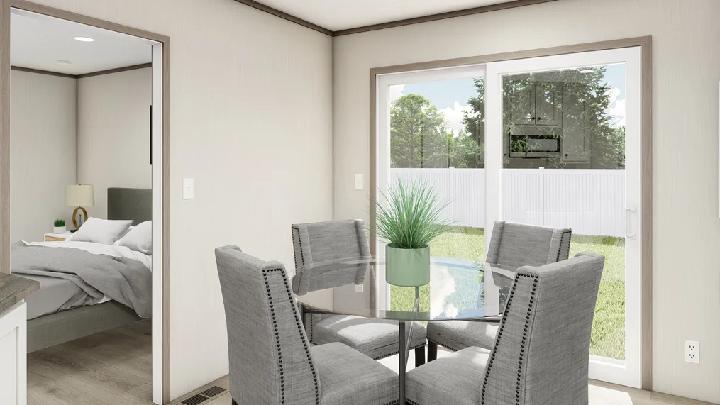 The ULTRA A-PLUS 16X76 Dining Room. This Manufactured Mobile Home features 3 bedrooms and 2 baths.