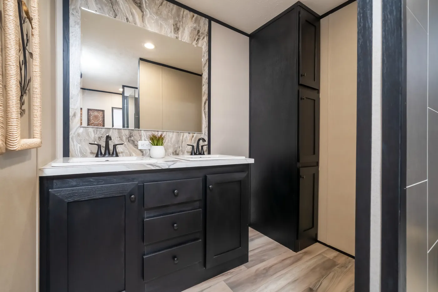 The THE SMOKEY Primary Bathroom. This Manufactured Mobile Home features 3 bedrooms and 2 baths.