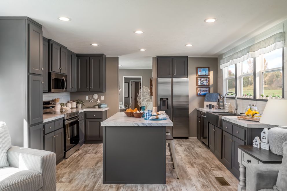 The THE DRIFTWOOD Kitchen. This Manufactured Mobile Home features 3 bedrooms and 2 baths.