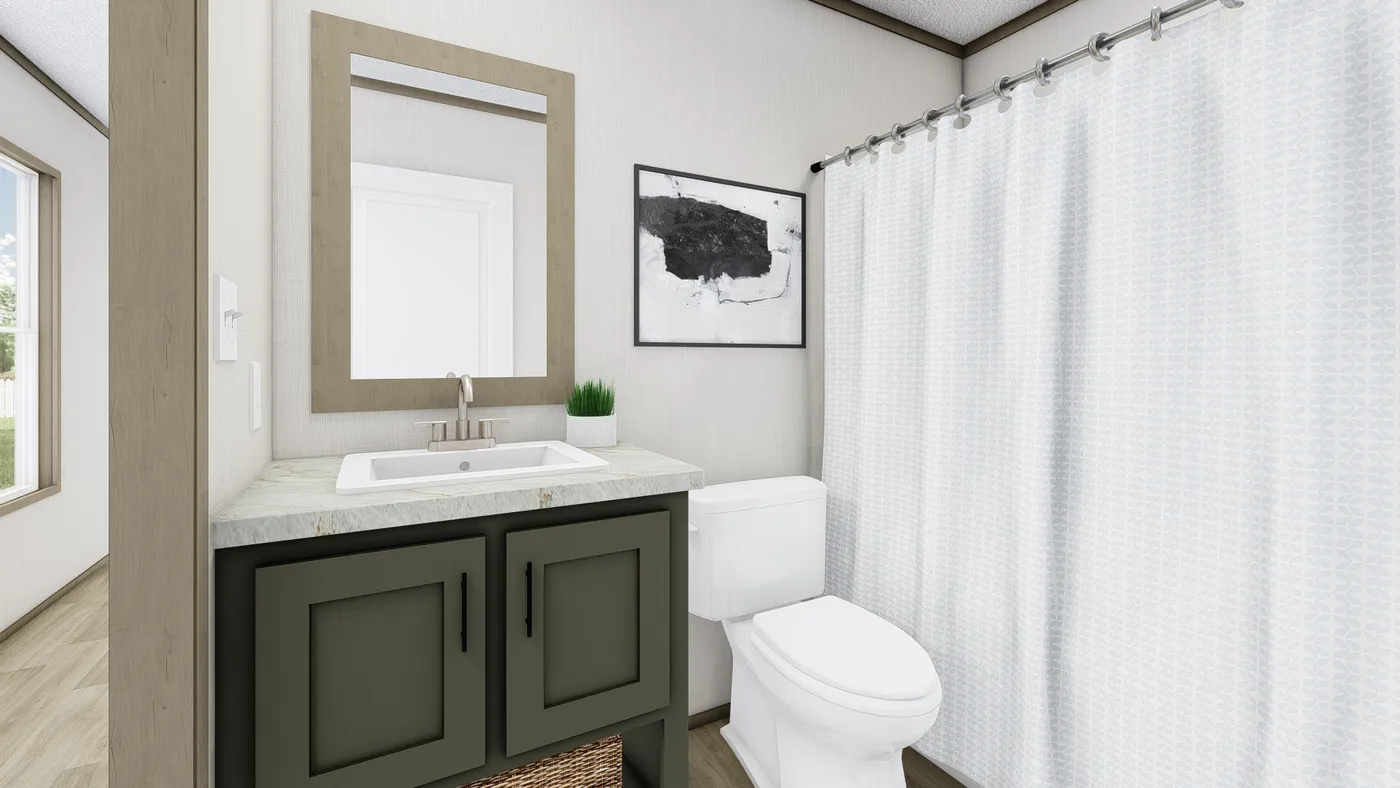 The LEWIS Guest Bathroom. This Manufactured Mobile Home features 2 bedrooms and 2 baths.