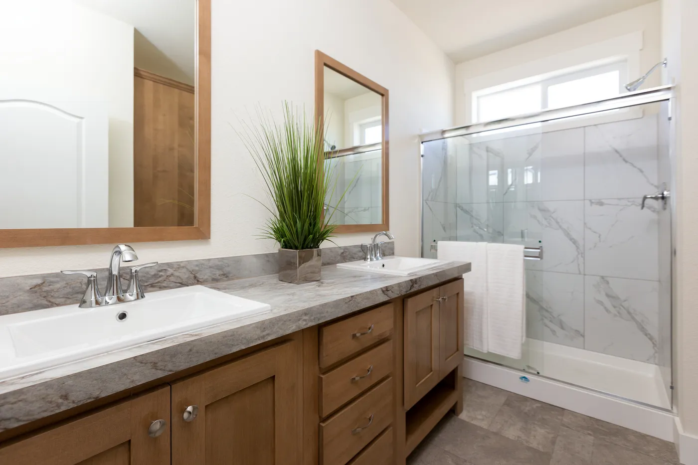 The CORONADO 24563C Primary Bathroom. This Manufactured Mobile Home features 3 bedrooms and 2 baths.