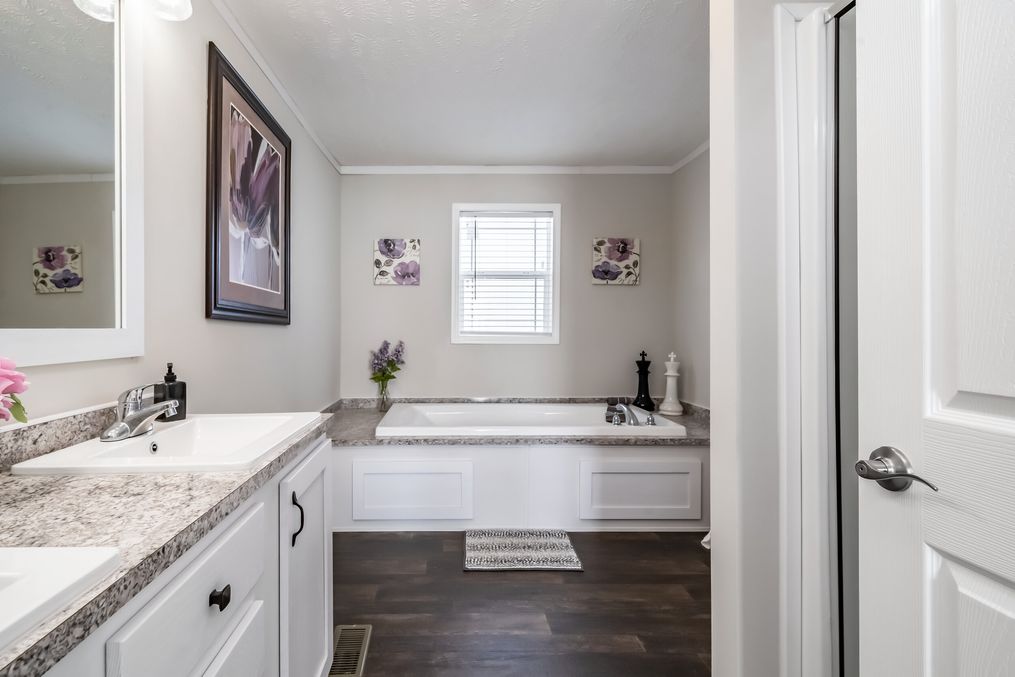 The TUCSON Master Bathroom. This Manufactured Mobile Home features 3 bedrooms and 2 baths.