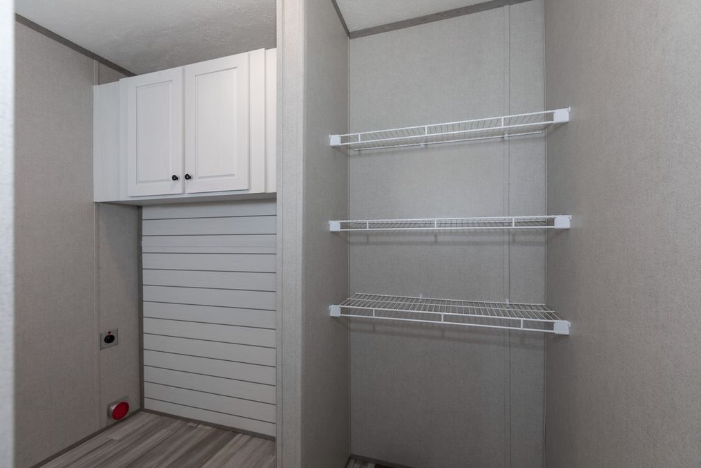 The BLAZER 76 P Utility Room. This Manufactured Mobile Home features 3 bedrooms and 2 baths.