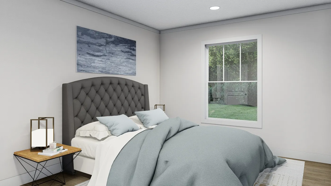 The BORN TO RUN Primary Bedroom. This Manufactured Mobile Home features 2 bedrooms and 2 baths.