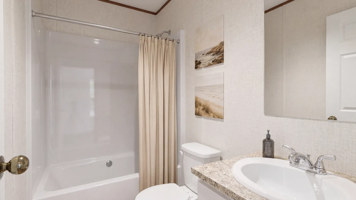The SYCAMORE Guest Bathroom. This Manufactured Mobile Home features 4 bedrooms and 2 baths.