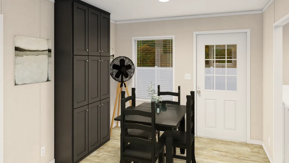 The GRAND LIVING 76B Dining Area. This Manufactured Mobile Home features 3 bedrooms and 2 baths.