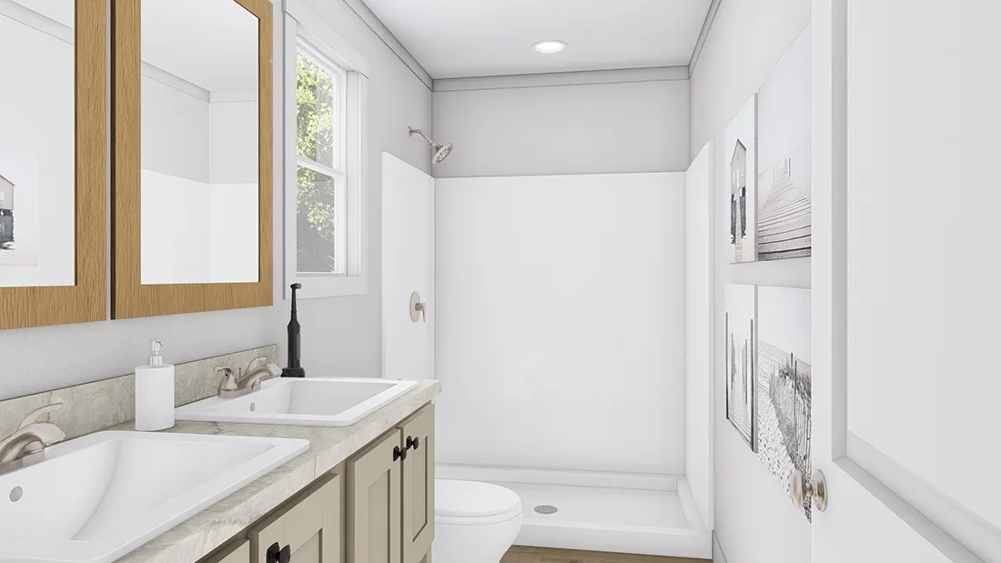The PURPLE RAIN Primary Bathroom. This Manufactured Mobile Home features 3 bedrooms and 2 baths.