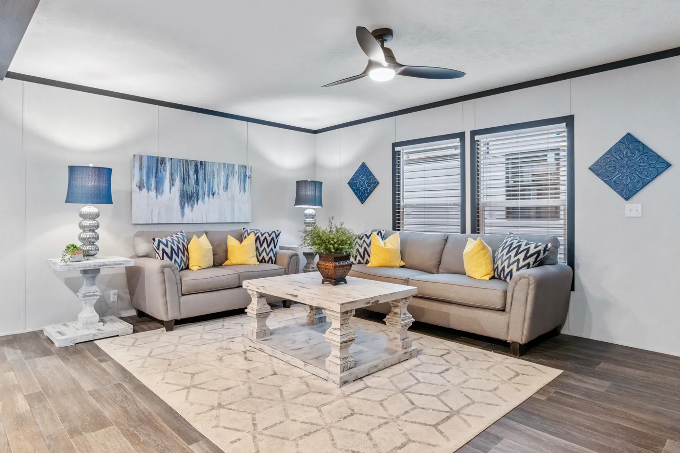 The THE RENEGADE Living Room. This Manufactured Mobile Home features 3 bedrooms and 2 baths.