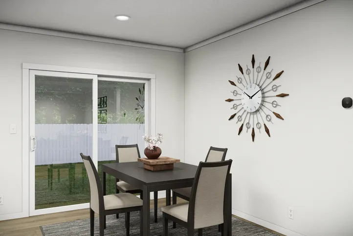 The THE PARKER Dining Area. This Manufactured Mobile Home features 3 bedrooms and 2 baths.