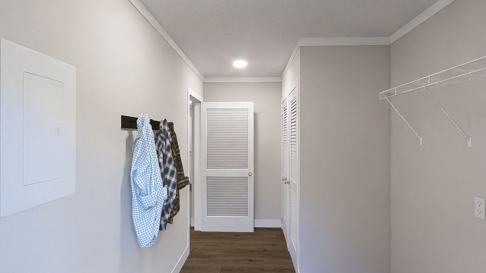 The LEAN ON ME Utility Room. This Manufactured Mobile Home features 3 bedrooms and 2 baths.