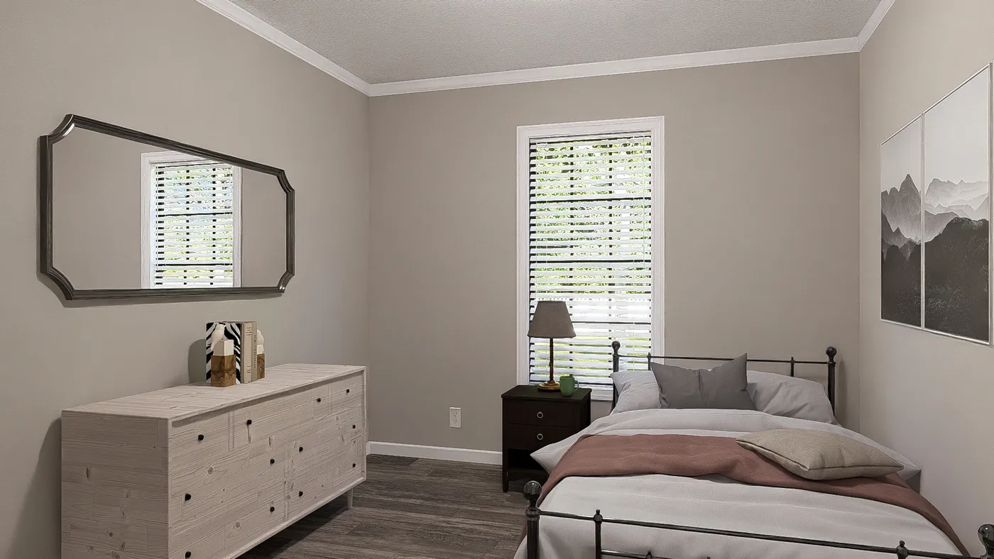 The THE LIL' EASY Bedroom. This Manufactured Mobile Home features 3 bedrooms and 2 baths.
