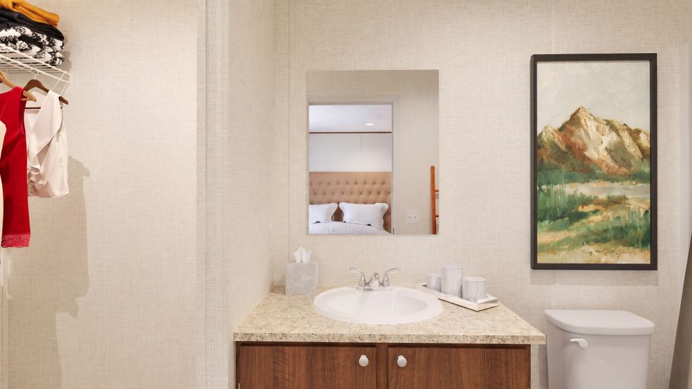 The HICKORY Primary Bathroom. This Manufactured Mobile Home features 3 bedrooms and 2 baths.