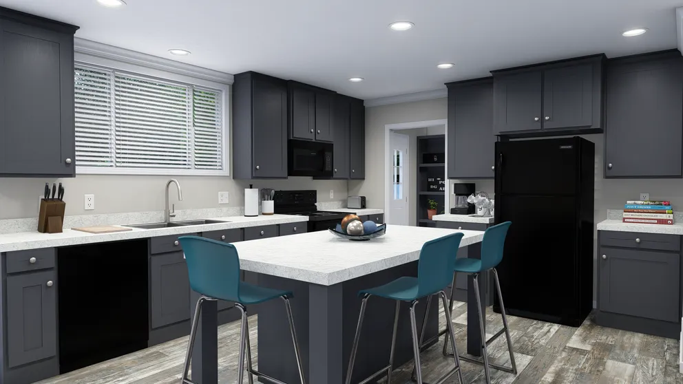 The CAROLINIAN M5000 Kitchen. This Manufactured Mobile Home features 3 bedrooms and 2 baths.