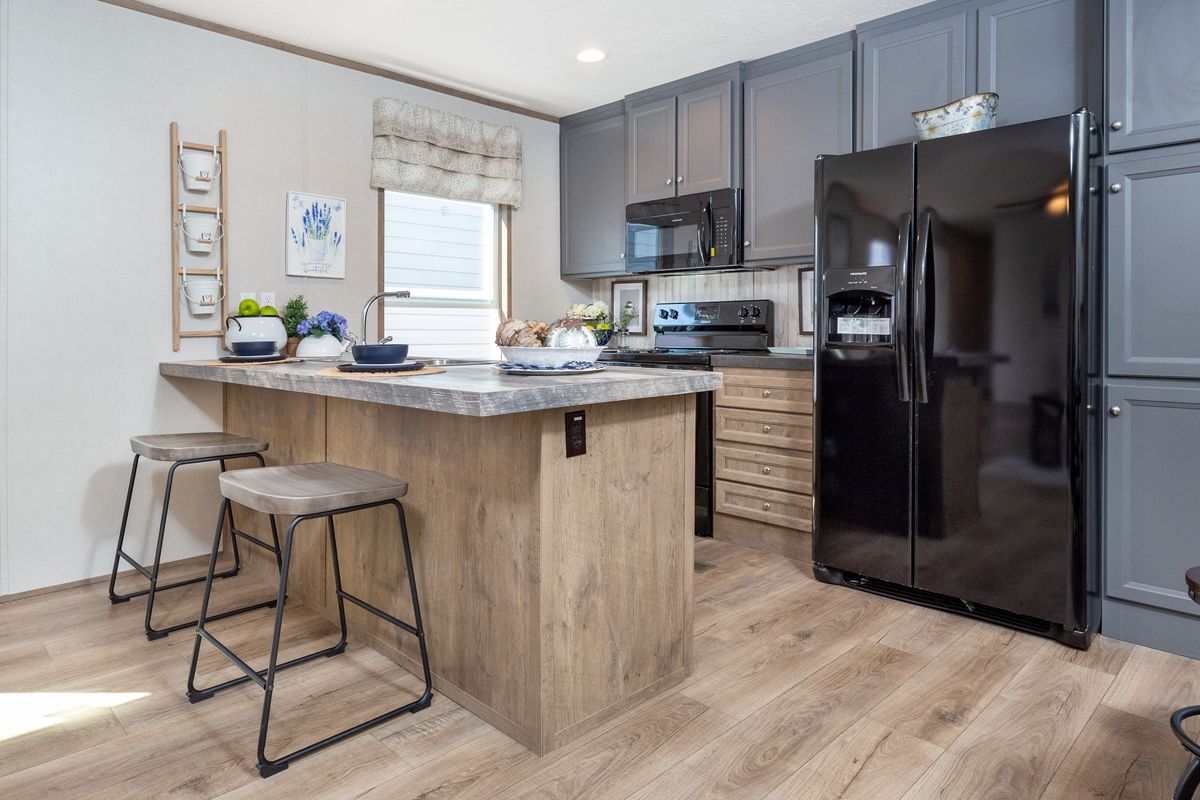The FLEX HOUSE Exterior. This Manufactured Mobile Home features 3 bedrooms and 2 baths.