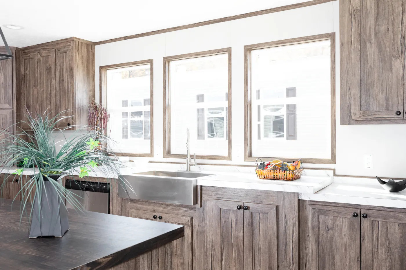 The LEWIS Kitchen. This Manufactured Mobile Home features 3 bedrooms and 2 baths.