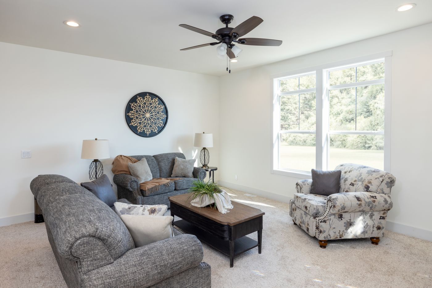 The 50TH ANNIVERSARY MOD Living Room. This Modular Home features 3 bedrooms and 2 baths.