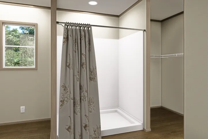 The SUMMIT Primary Bathroom. This Manufactured Mobile Home features 4 bedrooms and 3 baths.