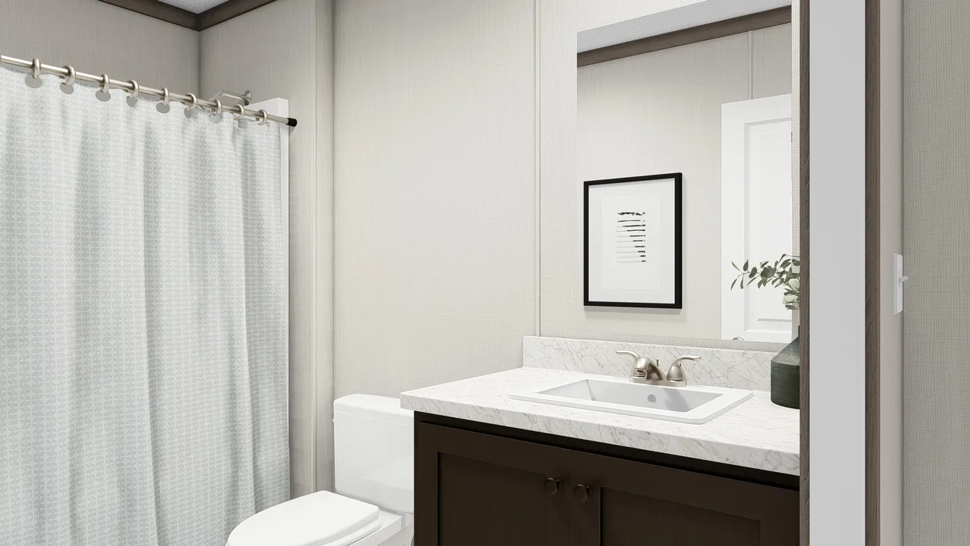 The ULTRA PRO 4 BR 28X60 Guest Bathroom. This Manufactured Mobile Home features 4 bedrooms and 2 baths.