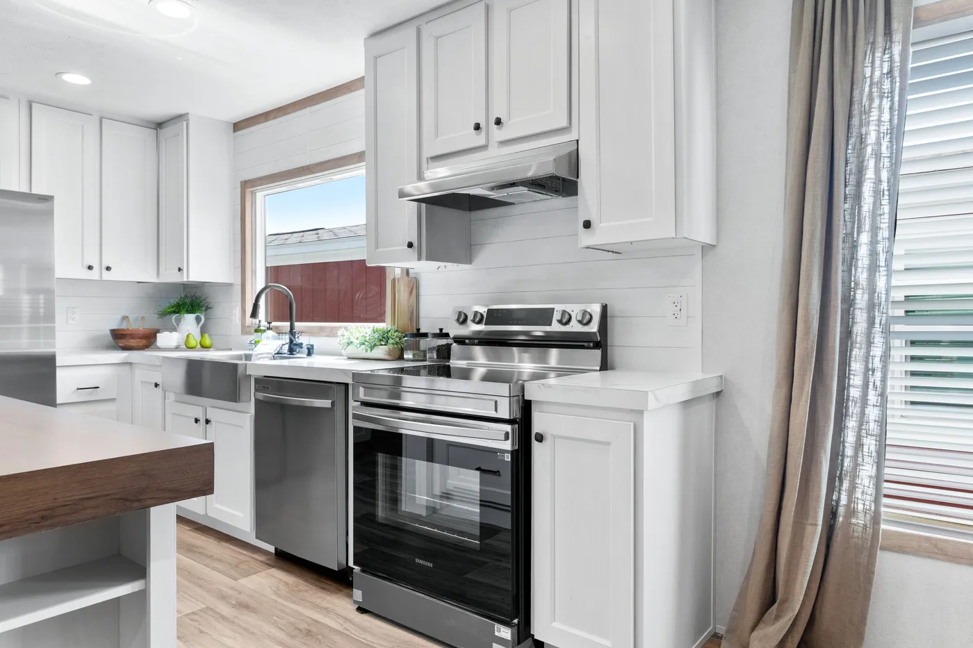 The THE REAL DEAL Kitchen. This Manufactured Mobile Home features 3 bedrooms and 2 baths.