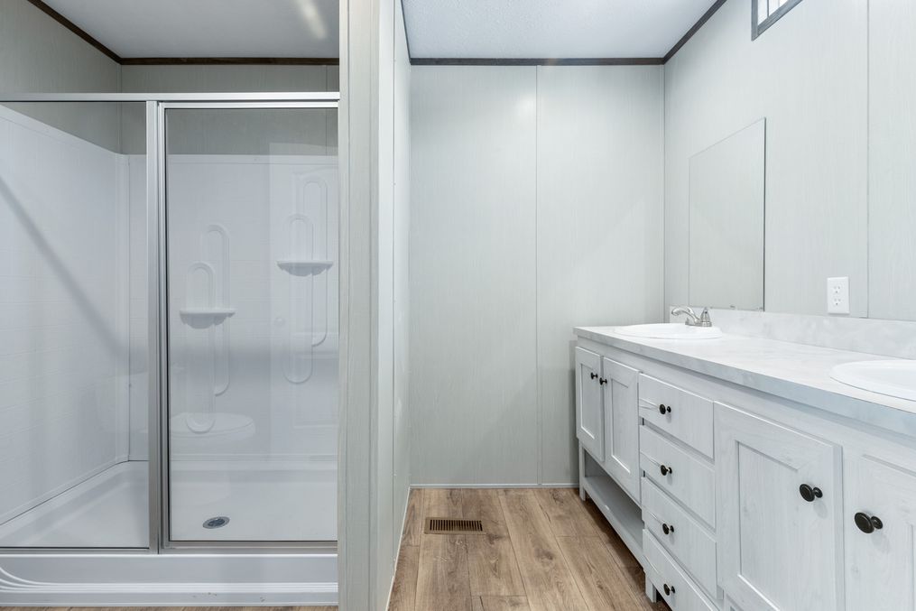 The SELECT 16602A Primary Bathroom. This Manufactured Mobile Home features 2 bedrooms and 2 baths.