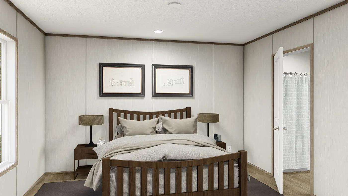 The VISTA Primary Bedroom. This Manufactured Mobile Home features 3 bedrooms and 2 baths.