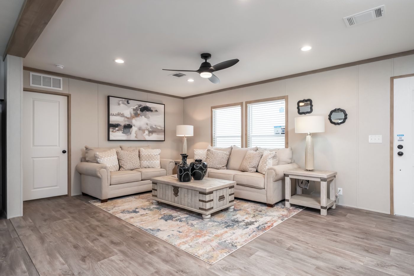 The PT 78 Living Room. This Manufactured Mobile Home features 3 bedrooms and 2 baths.