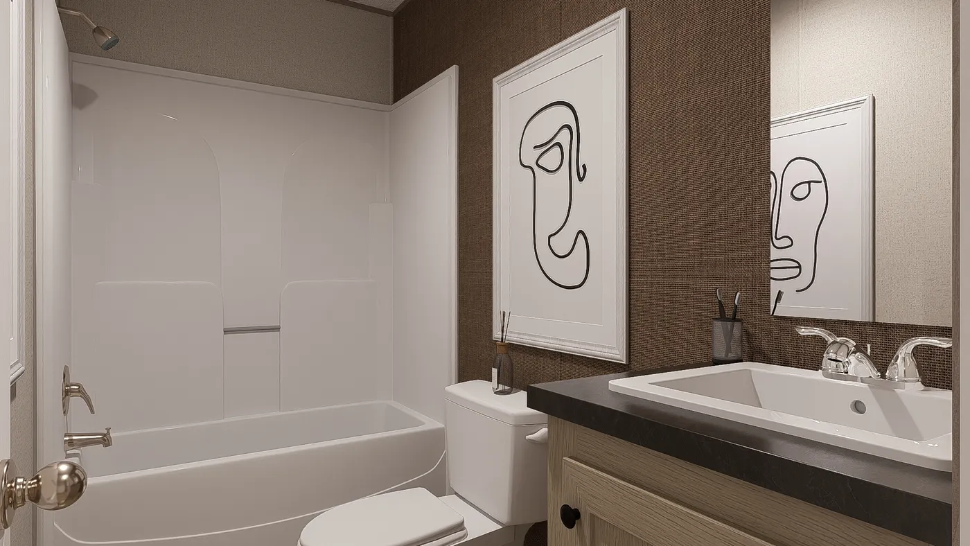 The BLAZER 66 F Guest Bathroom. This Manufactured Mobile Home features 3 bedrooms and 2 baths.