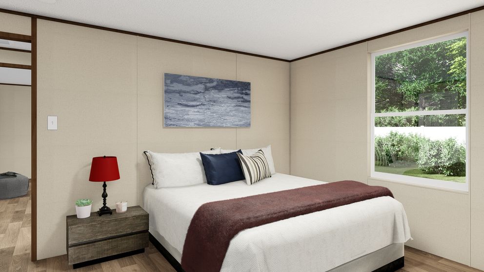 The TRIUMPH Bedroom. This Manufactured Mobile Home features 5 bedrooms and 3 baths.