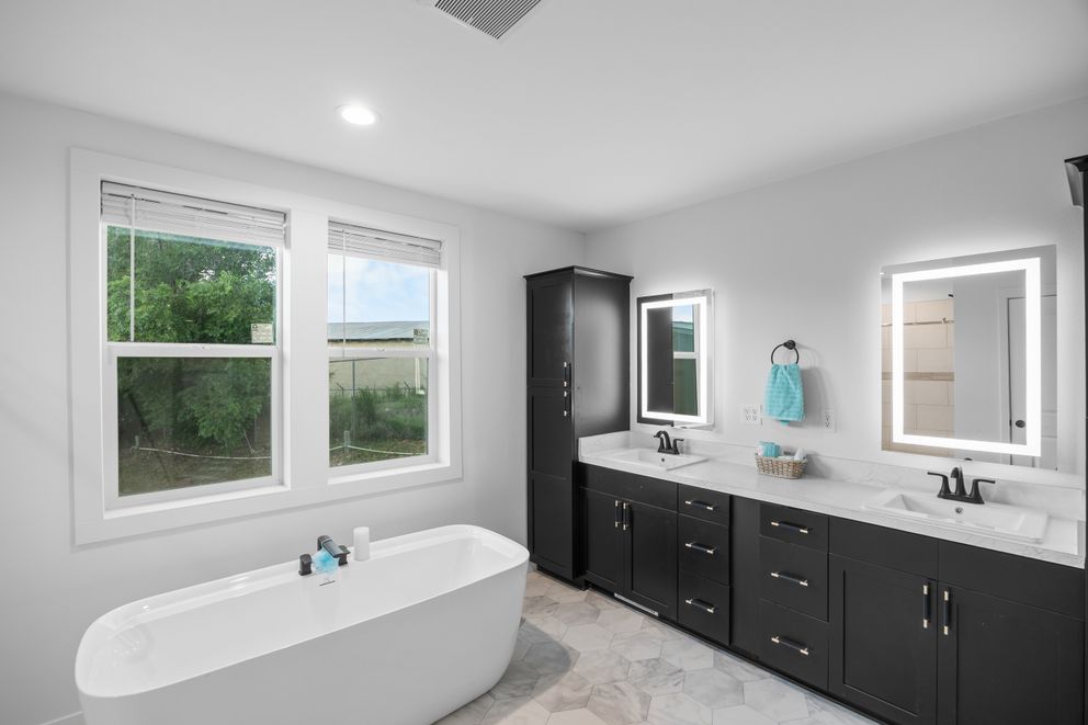 The LULAMAE 3 Primary Bathroom. This Manufactured Mobile Home features 3 bedrooms and 2 baths.