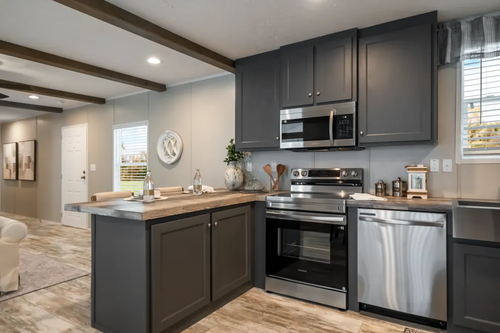 The ANNIVERSARY CHOICE Exterior. This Manufactured Mobile Home features 3 bedrooms and 2 baths.