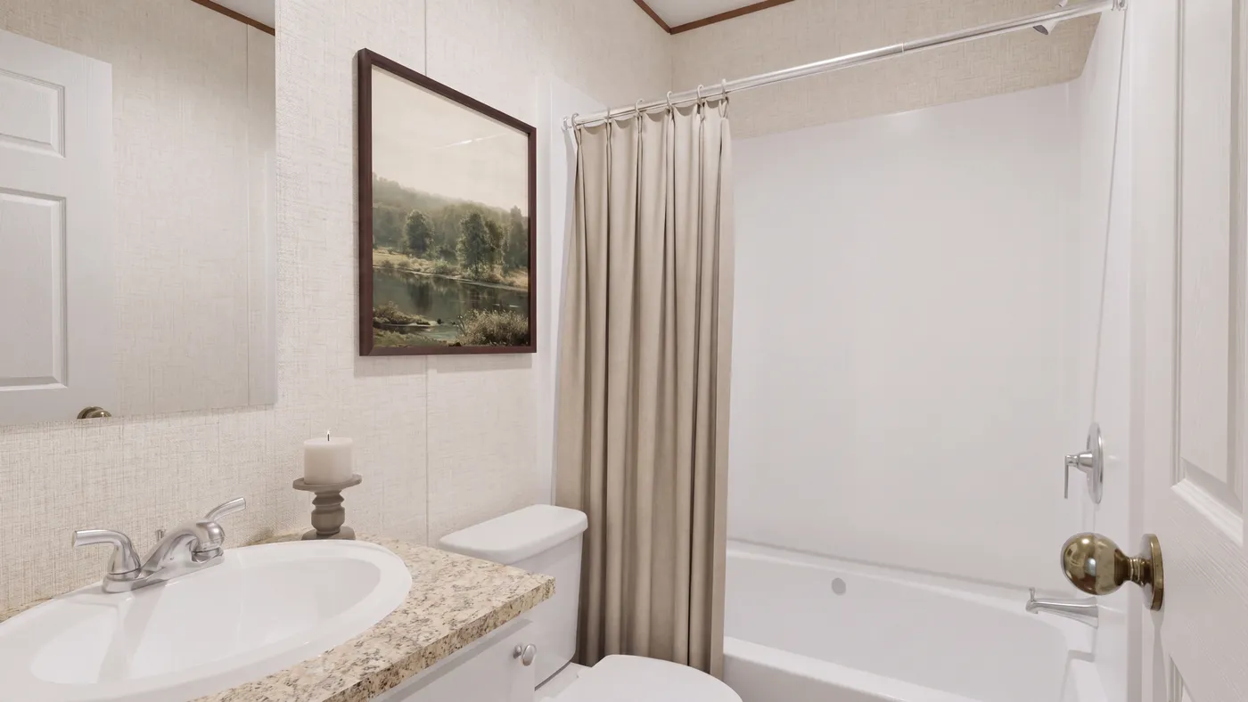 The BUTTERCUP Primary Bathroom. This Manufactured Mobile Home features 1 bedroom and 1 bath.